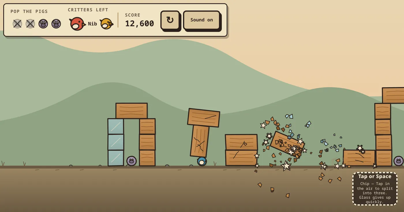 SLINGWRECK gameplay: wooden crates and glass blocks collapsing across green hills after a shot